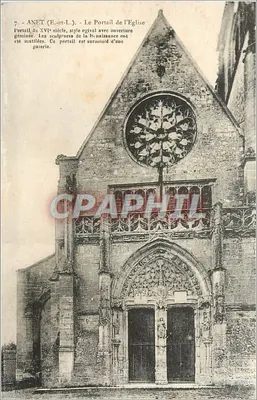 Anet (E.-et-L.) — O Portal da Igreja — estilo gótico com abertura dupla, sobreposto por uma roseira
