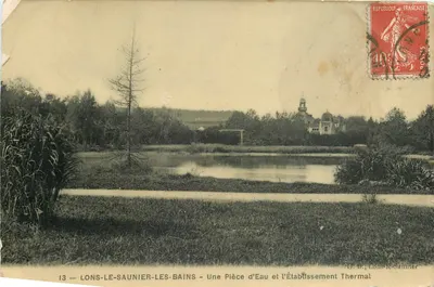 Bilhete postal antigo Lons-le-Saunier-les-Bains - Uma Peça de Água e a Instalação Termal