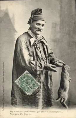 Charente — Homem usando traje tradicional segurando um coelho — Livraria Barraud, Augoulin