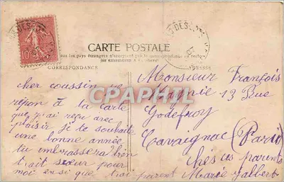 Młoda kobieta trzymająca kartę pocztową — gra w zgadywanie — J.K. — Rewers