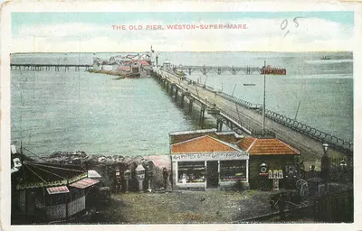 O velho ponte, Weston-super-Mare — vista da ponta com quiosque de souvenirs — editor não identificado