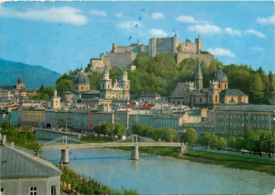 Salzburgo — vista panorâmica com castelo e ponte — editor Huttegger, n° 230