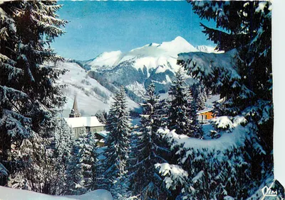 Les Gets - Haute-Savoie — vista invernal com igreja e montanha nevada — editor Jim