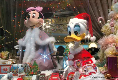 Minnie e Donald em traje de Natal — Tokyo Disneyland — Walt Disney Co. © MCMLXXXVII