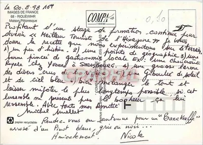 Riquewihr — Casa pitoresca com vitrais e flores — Verso