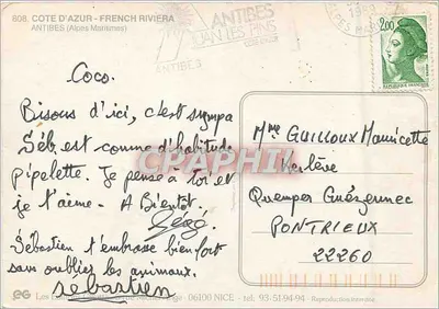 Antibes - Côte d'Azur — widok panoramiczny z palmami i czerwonymi kwiatami — Côte d'Azur — Rewers