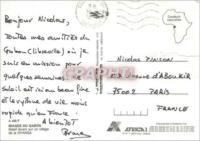 Sol nascente sobre uma aldeia da Nyanga — Imagens do Gabão — Edição Africa 1 — Verso