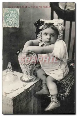 Niña sentada — con jarra de caramelos — editor N. Marnel