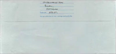 Envelope postal — Manchester — Royal Mail First Class — Verso