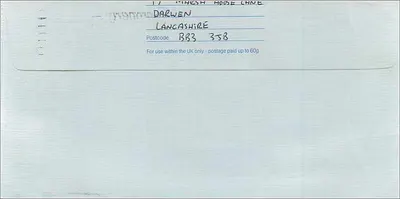 Envelope postal — Manchester — Royal Mail First Class — Verso