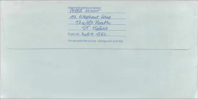 Manchester, M.I. — Envelope postal First Class — Royal Mail — Verso