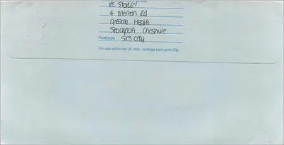 Carta postal enviada de Manchester para Stockport — Royal Mail First Class — Verso