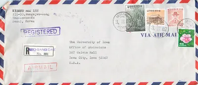 Karta pocztowa lotnicza z Seulu do Iowa City — znaki koreańskie i znak przyjęcia