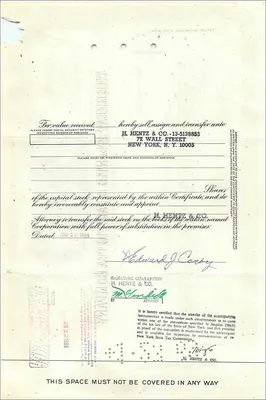 Certificado de 100 acciones de la Great Atlantic & Pacific Tea Company — Edward J. Corby — transferido a H. Hentz & Co. — Reverso