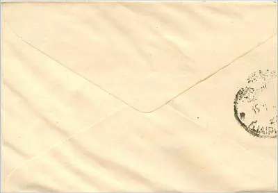 Carta postal indiana — endereço manuscrito em devanagari — selo de 100 rupias — Verso