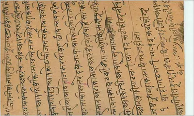 Pocztówka z Indii — Gwalior — tekst w pismie devanagari — znak pocztowy i pieczęć — Rewers