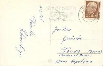 Widok na zasnieżone wioski — kamienne okno ozdobione — wydawca nie widoczny — Rewers