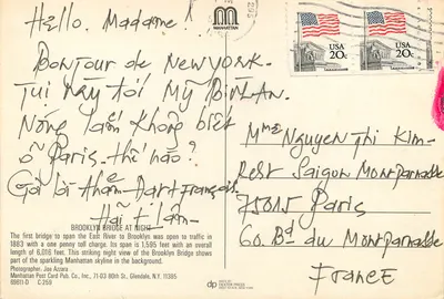 Brooklyn Bridge 's nachts — uitzicht op de horizon van Manhattan — uitgever Manhattan Post Card Pub. Co., n° C-259 — Achterkant