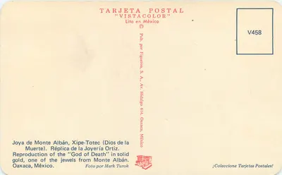 Joya de Monte Albán, Xipe-Totec (Bóg Śmierci) — Reprodukcja w złocie — Figueroa, S.A., Oaxaca, Meksyk — Rewers