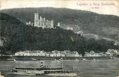 Capellen e Burg Stolzenfels no Reno — vista do castelo e do rio com barco
