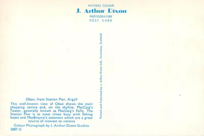 Oban, Plac tranzystorowy — widok na centrum handlowe i wieżę MacCaig's — J. Arthur Dixon — Rewers