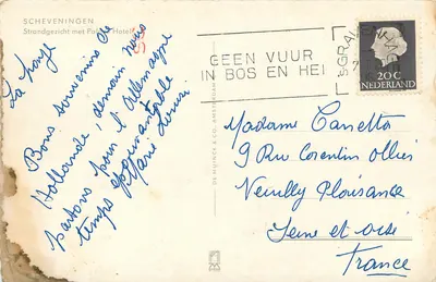 Scheveningen — praia animada diante do Palace Hotel — editor De Muinck & Co. Amsterdam — Verso
