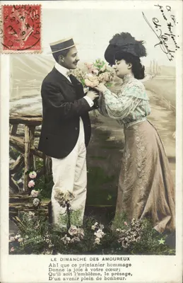 Un homme offrant des fleurs à une femme — Le Dimanche des Amoureux — Éditeur L. Normand, Paris