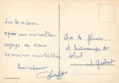 Casal em traje tradicional — diante de uma casa de madeira — Krüger 1036/45 — Verso
