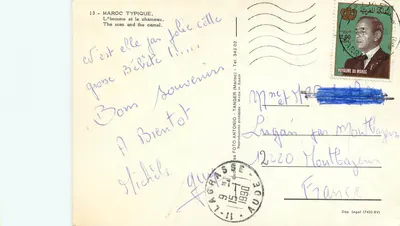 Człowiek i kamel — typowy Marok — FOTO ANTONIO, Tanger — Rewers