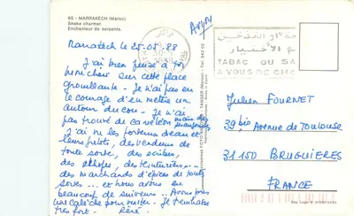 Marrakech — Człowiek z wężem — FOTO ANDONDO — Rewers