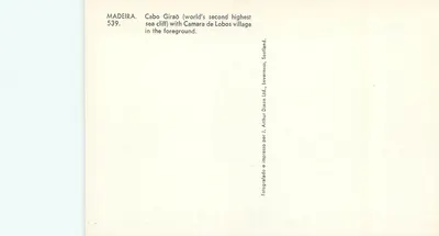 Madeira — Cabo Girão (segunda falda marina del mundo) con el pueblo de Camara de Lobos en primer plano — Arthur Dixon Ltd. — Reverso