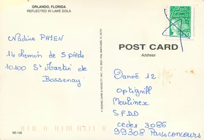 Orlando — Vista noturna com fonte e arranha-céus — Scenic Card & Novelty, Inc. SE-106 — Verso
