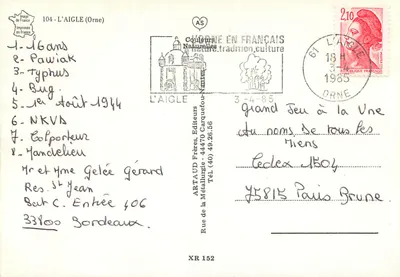 L'AIGLE — Vista panorâmica com museu Junho 44, castelo, velha casa, ponte sobre a Risle — Editor ARTAUD Frères — Verso