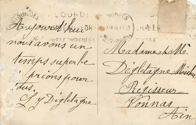 Lourdes — Pocztówka z kwiatem z kamienia cudownego — La Griffe — Rewers