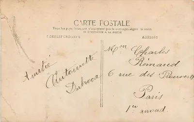 Enfant avec panier de Pâques — scène de jardin — éditeur J.K. — Verso