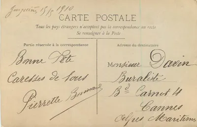 Niña en vestido rosa sosteniendo una pancarta 'Buen Año' — editor CIRCE, n° 4283 — Reverso
