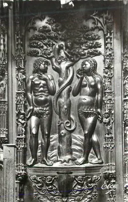 Adão e Eva ao pé da árvore do conhecimento — escultura em madeira — Editor 'Eleg' (assinatura)