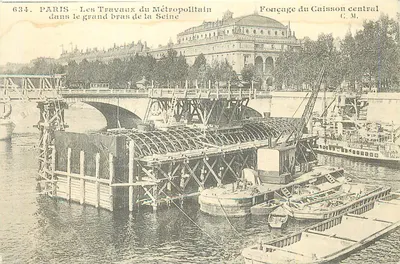 PARIS — Prace nad Metropolitainem w dużym ramieniu Seiny — Wbijanie centralnego kanału (G. M.)