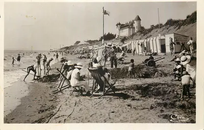 Praia animada em Cim — editor Cim, número de série não visível