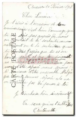 Mujer en vestido verde sosteniendo un ramo — Cumpleaños — Tarjeta postal francesa — Reverso