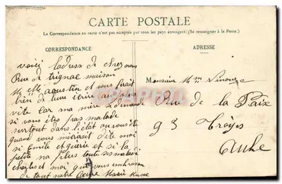 Girl in sailor outfit at St-Nazaire — view of the beach — publisher Delaveau, St-Nazaire, no. 604 — Back