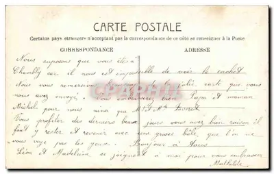 Młoda kobieta w kapeluszu z kwiatami trzymająca bukiet — Kwiatowy wspomnienie nadziei — wydawca nieznany — Rewers