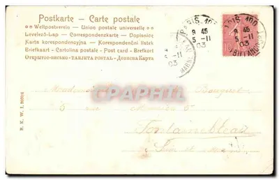 Vrouw onder een paraplu — houxbladeren — uitgever B. K. W. I. 20694 — Achterkant