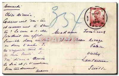 Grupo de militares — diante de um edifício de tijolos — Verso