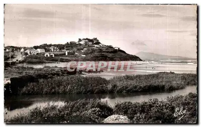 Vue da costa — praia e rio — Editor Elcé
