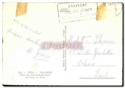 Zaświetlona ulica w Prayssac — sklep 'Aux Variétés' i 'La Dépêche' — Chegjec — Rewers