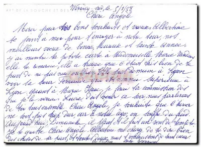 Fille blonde avec un bouquet — chien noir à côté — éditeur AKNULF — Verso