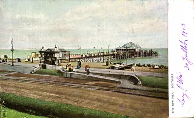 O Novo Pontão em Southsea — vista do cais e do pontão — editor Rational Tuck & Sons, série 'View' n° 1403