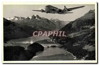 Passenger plane above an alpine lake — Swissair — publisher L. M. Kohler, Papier & Druck, Zurich