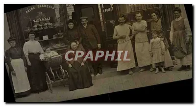 Family group in front of a bakery — Paris — publisher L. Poignet